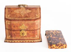 A tortoiseshell and pewter strung case, early 19th century; of faceted rectangular form,