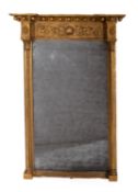 A Regency giltwood and composition framed pier mirror.