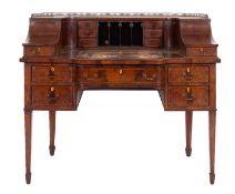 A mahogany and walnut banded Carlton House desk in George III style,