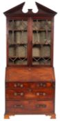 A George III mahogany and glazed bureau bookcase,