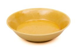 A Chinese porcelain yellow ground saucer dish,