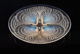 A Lalique plate 'Coquilles' the underside embossed with a series of shells, 20cm diameter,