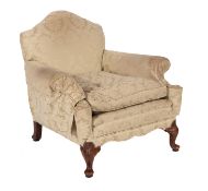 A green Damask upholstered armchair,