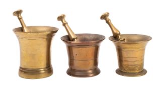 A bell metal mortar, last quarter 18th century; of flared cylindrical form and tall,