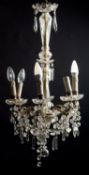 A gilt metal and moulded glass six light chandelier, in early 19th century taste,