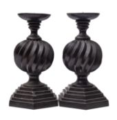 A pair of patinated bronze pricket candlesticks in 17th century taste,