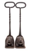 A pair of Victorian cast and wrought iron door porters,