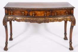 A bowfront walnut and marquetry hall table in Queen Anne style,