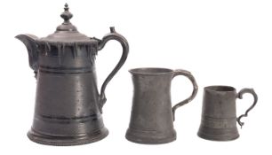 A large pewter flagon,
