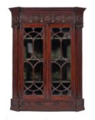 A mahogany and glazed corner cabinet in Neoclassical style,
