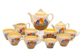 A Clarice Cliff part tea service in the Autumn Crocus pattern, comprising two tea pots and covers,