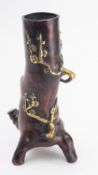 A Japanese bronze vase in the form of a tree trunk inlaid in gilt with flowering prunus and a