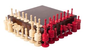 A turned, carved and partially stained bone Barleycorn pattern chess set,