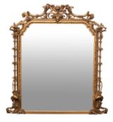A carved giltwood and composition framed overmantel mirror, probably Italian,