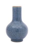 A Chinese Ge ware bottle vase under a crazed blue glaze, 15cm high.