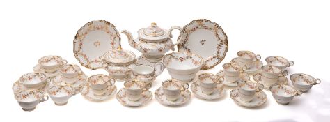 A Chamberlain Worcester porcelain part tea service decorated with pink flowers and gold swags