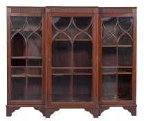 A mahogany and glazed breakfront bookcase in George III style,
