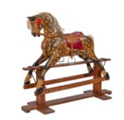 A Victorian carved and painted wood rocking horse, late 19th century and later; dappled overall,