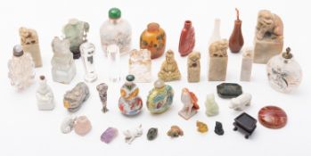 A collection of Chinese and other seals, snuff bottles and carvings, 19th/20th century in glass,