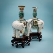 A pair of Chinese famille verte elephant vases,