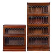 Four mahogany and leaded glass stacking bookcases by Globe Wernicke,