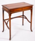 An Edwardian mahogany writing table,