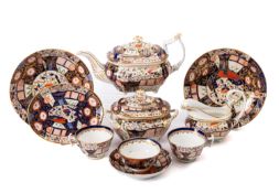 A small group of Derby porcelain, comprising a teapot and cover, stand, sugar bowl,