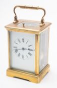 An Edwardian French Corniche Carriage clock the eight-day duration timepiece movement having a