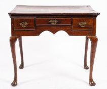 A George II oak lowboy,