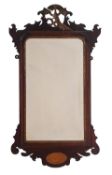 A mahogany and marquetry framed wall mirror in George II style,