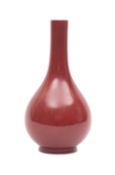 A Chinese porcelain flambé glazed vase of tear drop form, 23cm high.