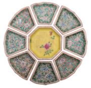 A Chinese famille rose hors d'ouvres set, late Qing/Republic of nine pieces,