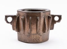 A Spanish bronze mortar, probably circa 1500; of faceted cylindrical form,