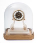 A French Alabaster swinging Cherub mantel clock the eight-day duration timepiece movement having