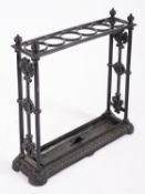 A Victorian black painted cast iron hallstand,