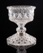 A cut glass goblet or sweetmeat dish with broad foot, knopped stem and finely cut bowl, 19cm high.