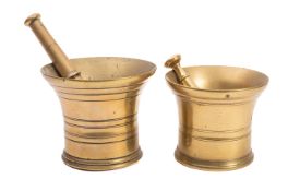 Two English brass mortars with pestles,