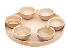 A Chinese Yue Ware pottery tea or wine set comprising a footed circular tray and six shallow