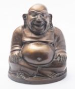 A large Chinese bronze figure of Budai the laughing Buddha cast with his hands resting on his