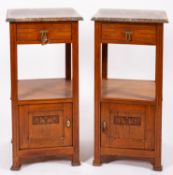 A pair of oak and marble topped bedside stands,