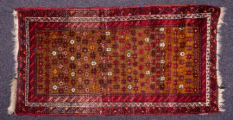 A Caucasian rug, the light brown field with an all over stellar design,