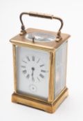 A French Victorian carriage clock with unusual alarm/silence the eight-day duration movement having