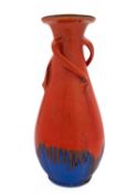 A Wesuma pottery uranium glazed vase, 1930s of baluster form with three spiral handles to the neck,