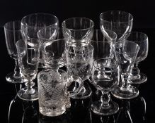 A glass presentation mug and eleven rummers and glasses, the former engraved Samuel Huston,