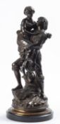 After Robert Cauer (German, 1863-1947); a patinated bronze group of a courting couple,