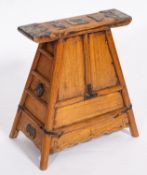A Chinese elm and brass mounted barber's stool,