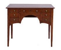 A mahogany and line inlaid side table in Regency style,