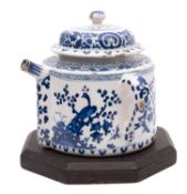 A large Dutch blue and white Delft posset pot and cover, early 18th century painted with peacocks,
