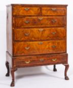 A George I walnut and crossbanded chest on stand,