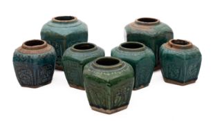 Seven Chinese stoneware jars and one cover,